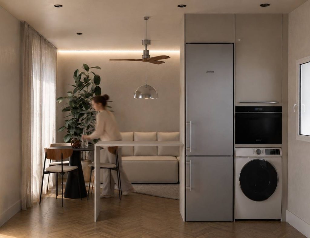 Vivienda en nogal en Madrid (RFG63): comedor abierto a la cocina de nogal